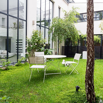Un jardin dans un loft industriel