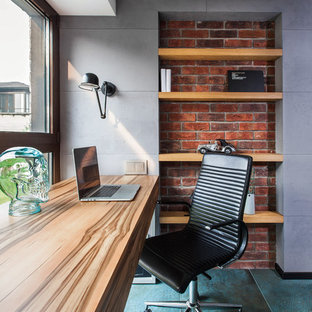 Aménagement d'un petit bureau contemporain avec un bureau intégré, un mur gris et un sol turquoise.