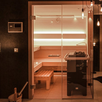 Einfamilienhaus in München - Gestaltung Sauna, Wohnbereich, Flur