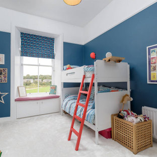 Design ideas for a contemporary kids' bedroom in Edinburgh with blue walls.