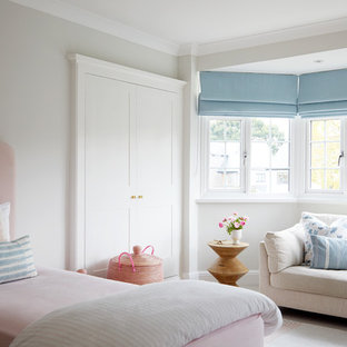 Classic kids' bedroom for girls in London with grey walls.