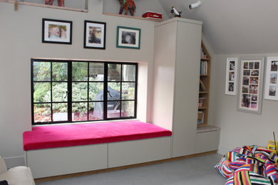 Medium sized contemporary playroom in Oxfordshire with concrete flooring.