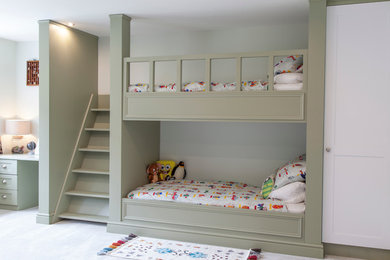 This is an example of a classic gender neutral children’s room in Essex with white walls.