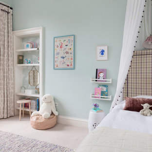 Design ideas for a traditional children’s room for girls in Edinburgh with blue walls and beige floors.