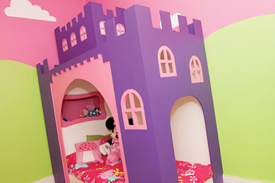 Design ideas for a contemporary children’s room for girls in Manchester with pink walls.