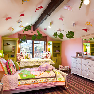 Inspiration for an eclectic girl carpeted and multicolored floor kids' room remodel in Salt Lake City with pink walls