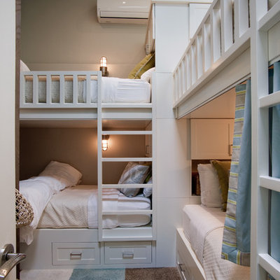 Example of a mid-sized beach style gender-neutral carpeted and multicolored floor kids' room design in San Diego with gray walls