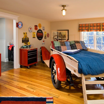 Kids' bedroom - traditional boy medium tone wood floor kids' bedroom idea in Boston with beige walls