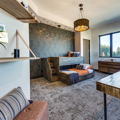 Example of a large trendy boy carpeted and gray floor kids' room design in Portland with white walls