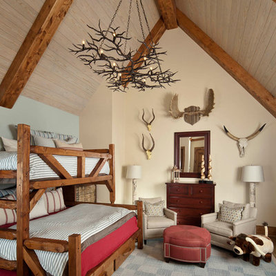 Elegant gender-neutral gray floor kids' room photo in Dallas with beige walls