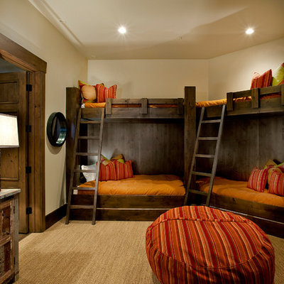 Example of a classic gender-neutral carpeted and beige floor kids' room design in Salt Lake City with beige walls