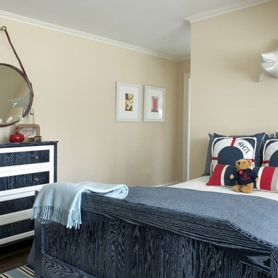 Kids' room - mid-sized transitional boy dark wood floor and brown floor kids' room idea in DC Metro with beige walls
