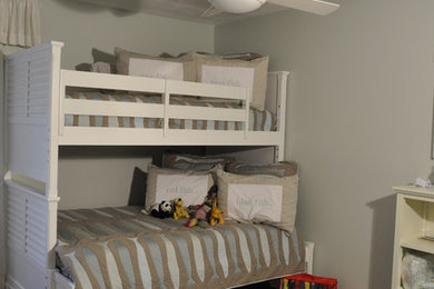 Kids' room - mid-sized contemporary gender-neutral medium tone wood floor kids' room idea in Other with gray walls