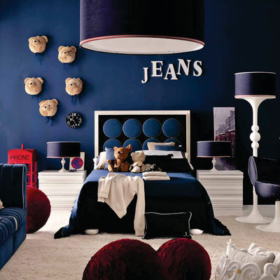 Kids' room - mid-sized modern boy carpeted kids' room idea in London with blue walls