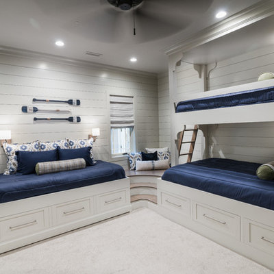 Kids' room - mid-sized coastal gender-neutral carpeted and white floor kids' room idea in Other with white walls