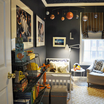 Inspiration for a small timeless boy carpeted kids' room remodel in DC Metro with blue walls