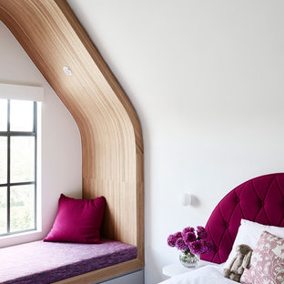 Design ideas for a scandinavian kids' room for girls in Melbourne with white walls.