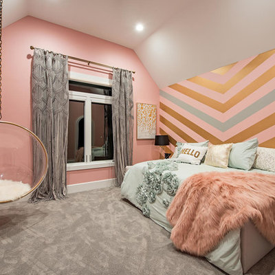 Example of a mid-sized transitional girl carpeted and gray floor kids' room design in Cleveland with multicolored walls