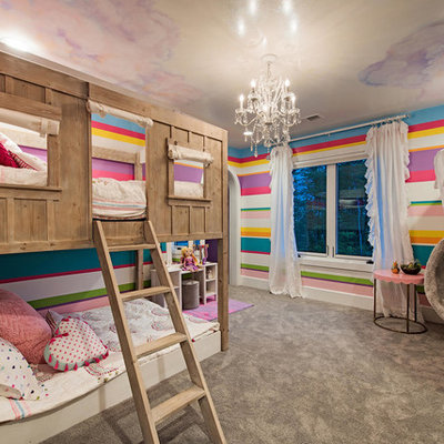 Inspiration for a mid-sized transitional girl carpeted and gray floor kids' room remodel in Cleveland with multicolored walls