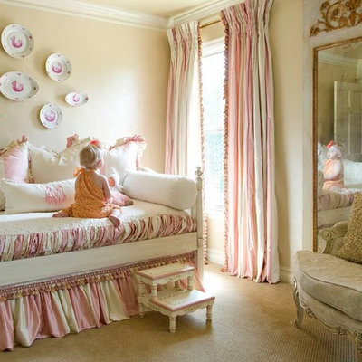 Inspiration for a timeless girl carpeted kids' room remodel in Little Rock with beige walls