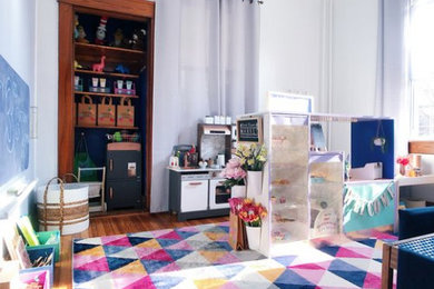 Ejemplo de dormitorio infantil de 1 a 3 años minimalista