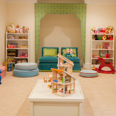 Example of an eclectic gender-neutral carpeted kids' room design in Baltimore with beige walls