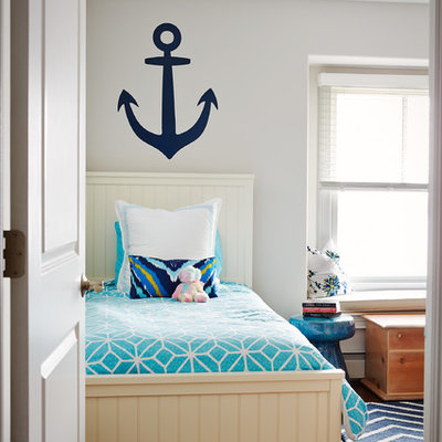 Mid-sized beach style gender-neutral dark wood floor and brown floor kids' room photo in Philadelphia with gray walls