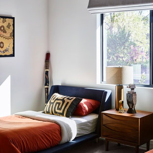 Design ideas for a contemporary gender-neutral kids' bedroom in Brisbane with white walls, carpet and grey floor.