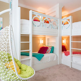 Kids' room - transitional girl carpeted kids' room idea in Orlando with beige walls