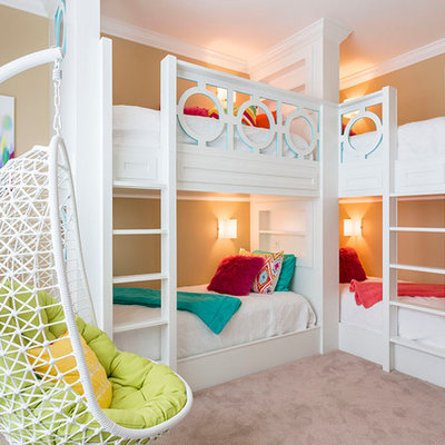 Kids' room - transitional girl carpeted kids' room idea in Orlando with beige walls