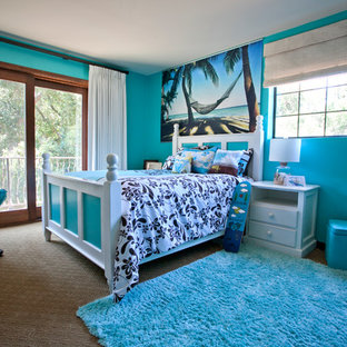 Inspiration for a tropical girl carpeted teen room remodel in Los Angeles with blue walls