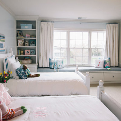Inspiration for a timeless gender-neutral carpeted kids' bedroom remodel in Chicago with blue walls
