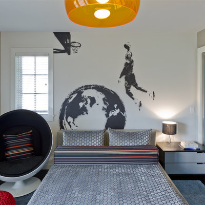 Mid-sized trendy boy dark wood floor kids' room photo in New York with gray walls