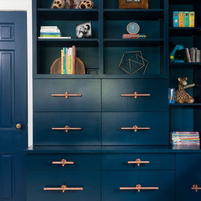 Kids' room - mid-sized 1950s boy painted wood floor and white floor kids' room idea in New York with white walls