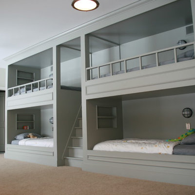 Inspiration for a timeless gender-neutral carpeted kids' room remodel in Other with gray walls