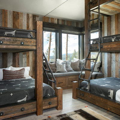 Kids' room - rustic gender-neutral light wood floor kids' room idea in Denver with multicolored walls