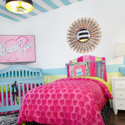 Example of an eclectic girl dark wood floor kids' bedroom design in Dallas with multicolored walls