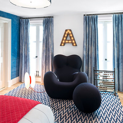 Kids' room - large contemporary boy carpeted kids' room idea in New York with white walls