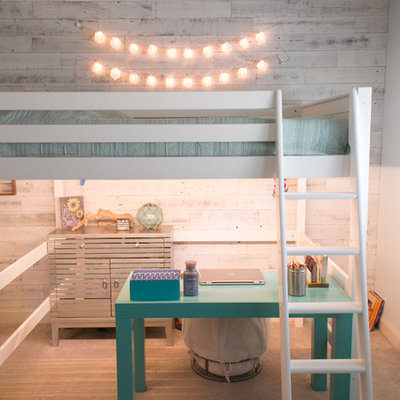 Large beach style girl carpeted and beige floor kids' room photo in Raleigh with blue walls