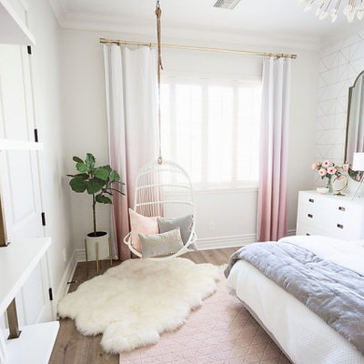Inspiration for a mid-sized transitional girl brown floor kids' room remodel in Phoenix with white walls