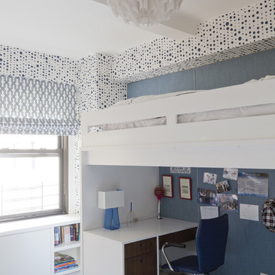 Trendy boy carpeted kids' room photo in New York with multicolored walls