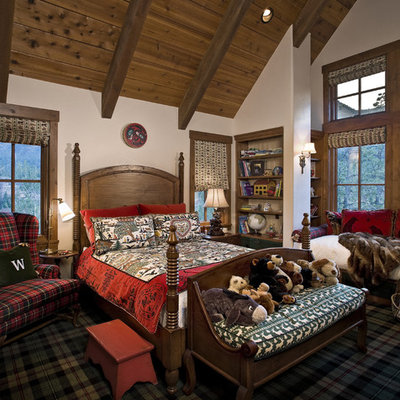 Example of a mountain style carpeted kids' bedroom design in Other with white walls