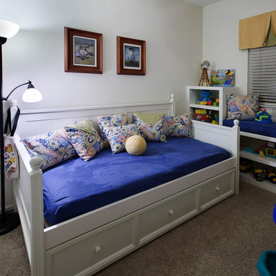 Inspiration for a mid-sized contemporary gender-neutral carpeted kids' room remodel in Sacramento with white walls