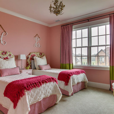 Example of a mid-sized classic girl carpeted kids' room design in Nashville with pink walls