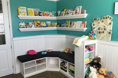 Medium sized classic kids' bedroom in Philadelphia with green walls, carpet and brown floors.