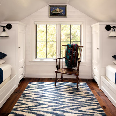 Inspiration for a small coastal gender-neutral dark wood floor kids' bedroom remodel in Milwaukee with white walls