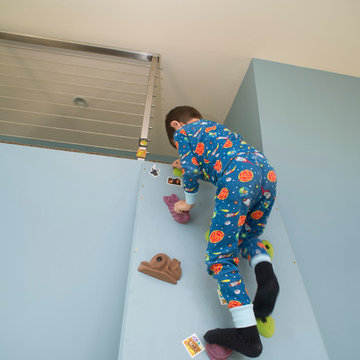 Climbing wall to loft in play room