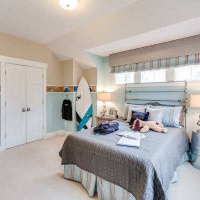 Inspiration for a coastal boy carpeted kids' room remodel in Other with multicolored walls