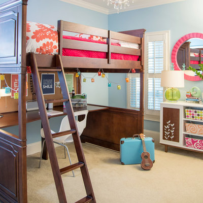 Inspiration for a transitional girl carpeted kids' room remodel in Raleigh with blue walls