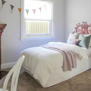 Design ideas for a traditional kids' room for girls in Sydney with white walls, carpet and beige floor.